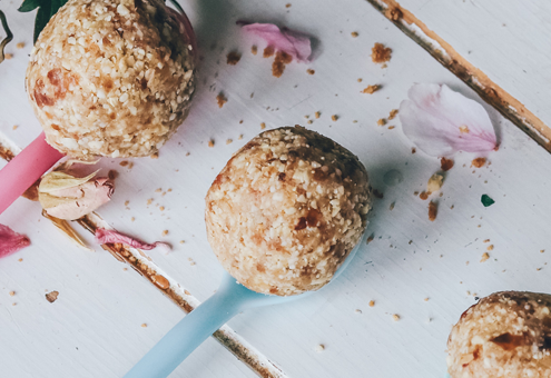 3 fig and cranberry balls on spoons