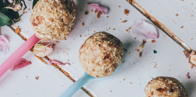 3 fig and cranberry balls on spoons