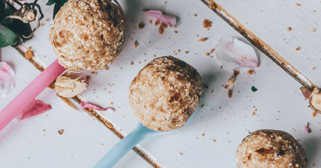 3 fig and cranberry balls on spoons