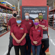 Staples employees posing for a picture