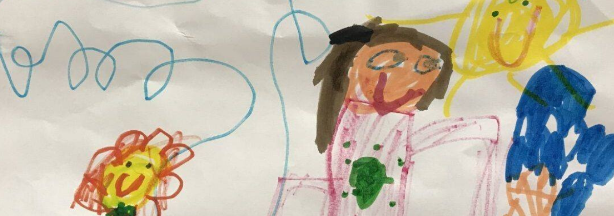 Children drawing of human and flower