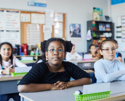 Children sitting in a classroom