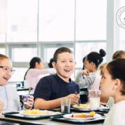 children laughing in cafeteria