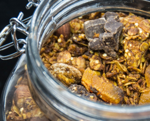 Close-up of harvest granola in a mason jar