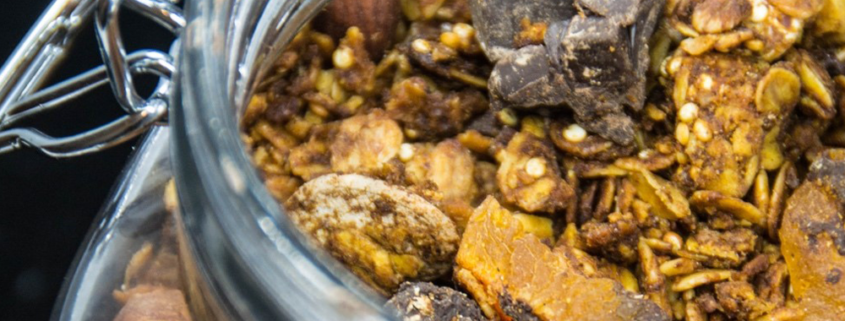 Close-up of harvest granola in a mason jar