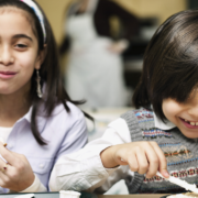 children enjoying breakfast together