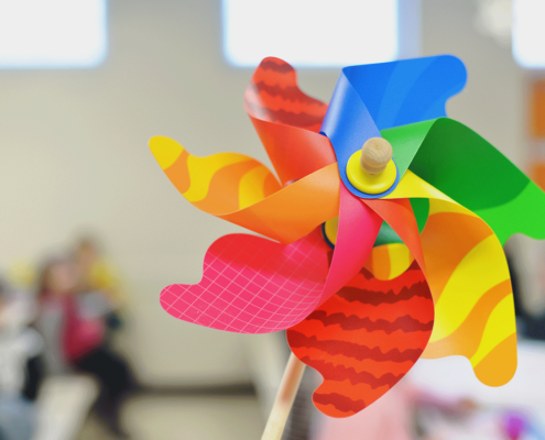 Pinwheel with blurred background of a classroom