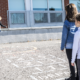 3 children playing hopscotch on a school playground