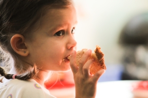 Children eating toast