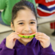 girl eating watermelon